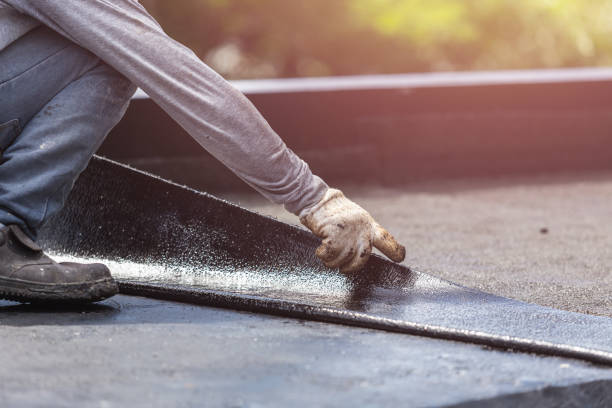 Professional Emergency Waterproofing technician working in Bellville, TX